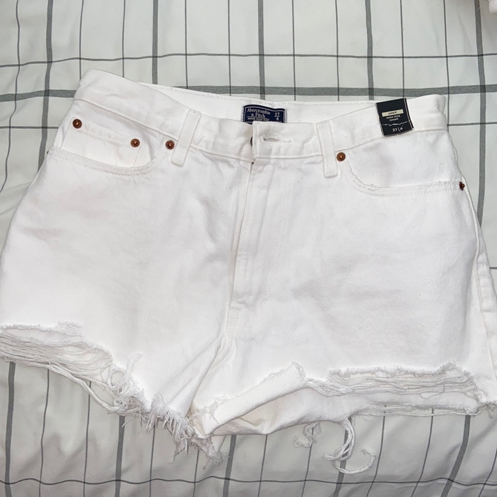 White high-waisted denim shorts